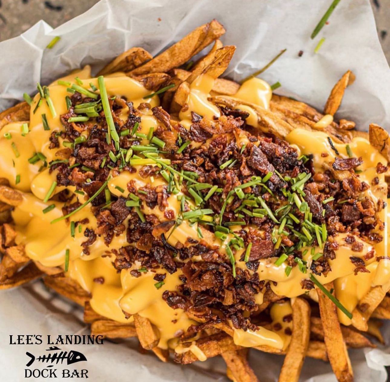 a bowl of loaded fries