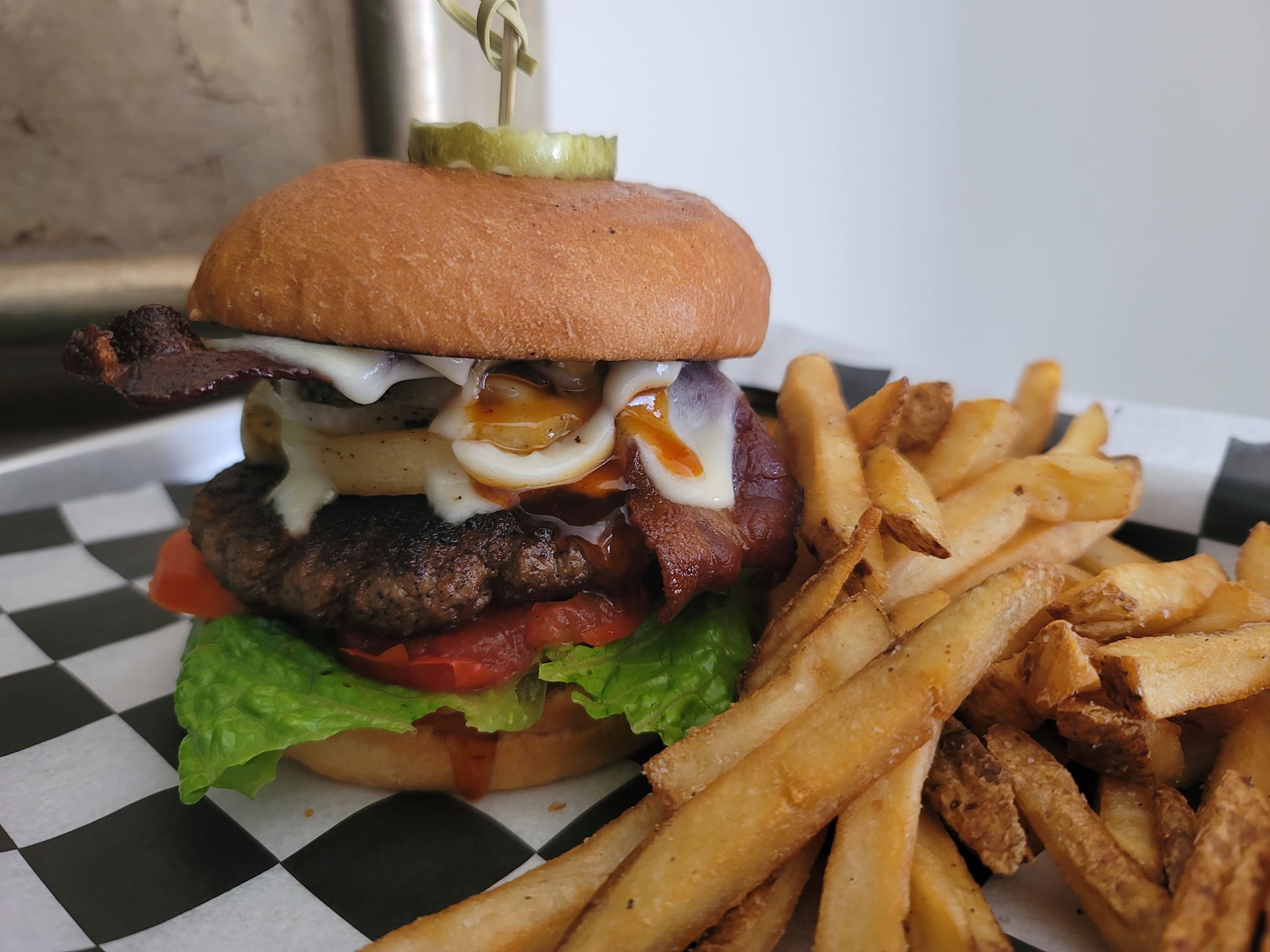 a cowboy burger with fries