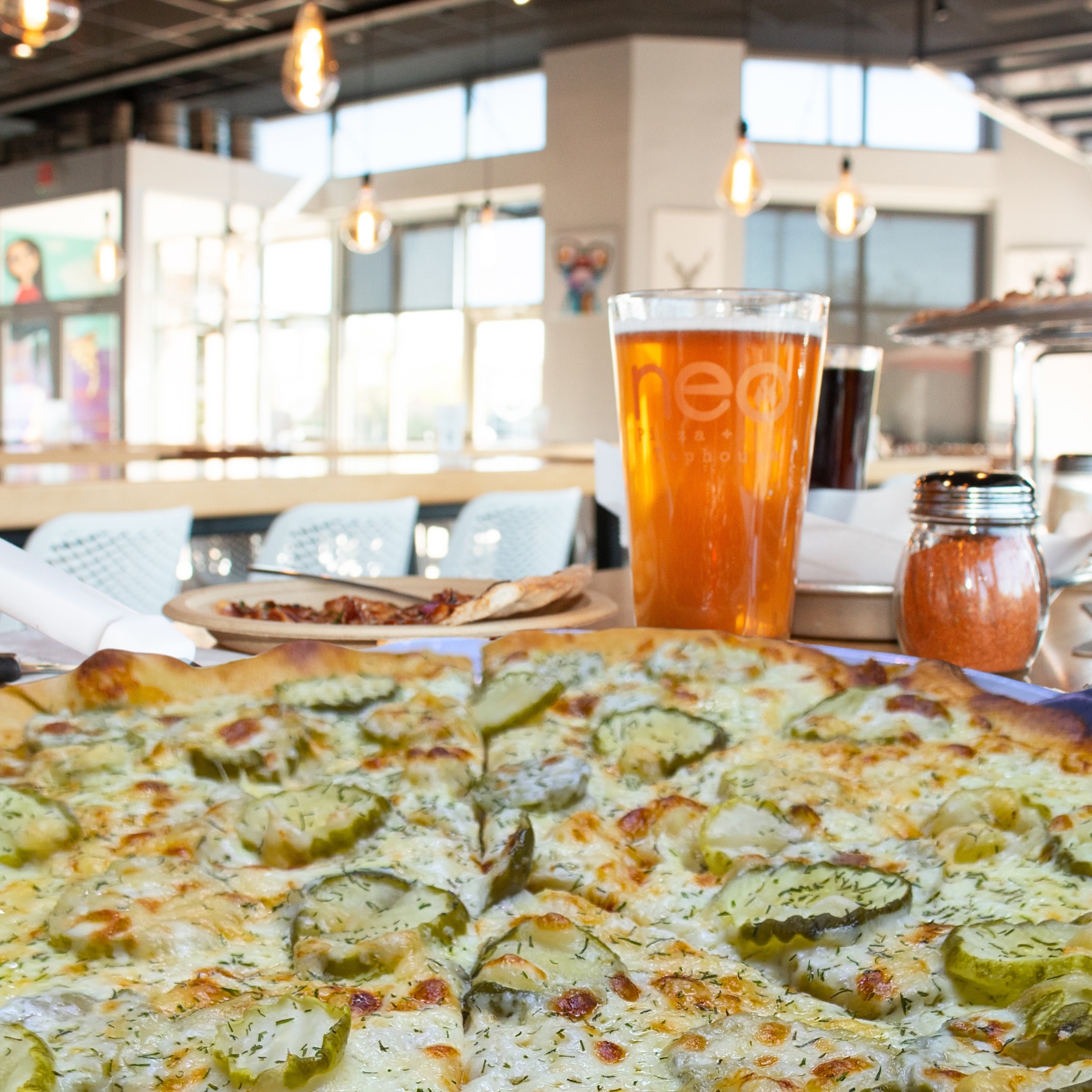 pizza and a drink on a table