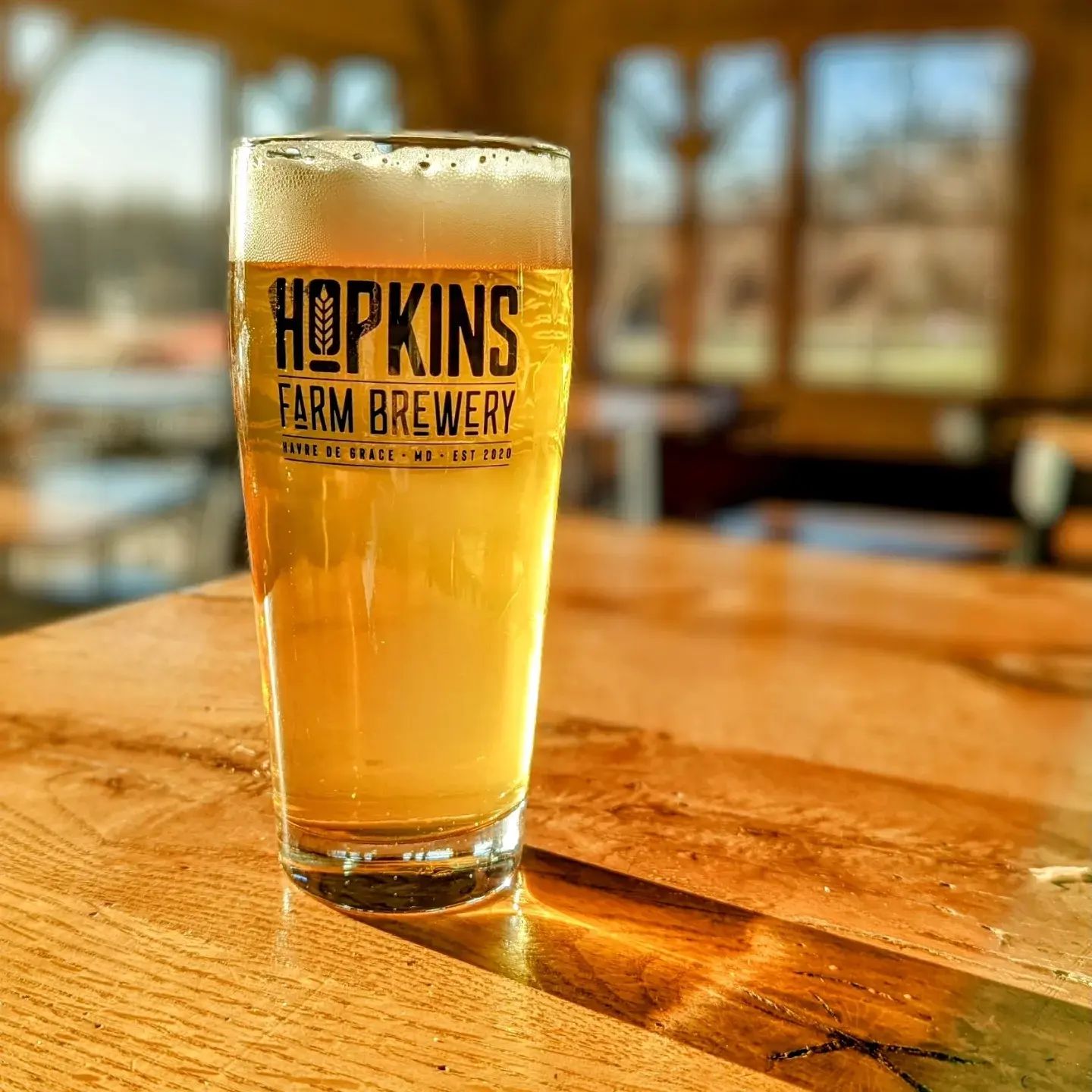 a glass of beer on a table