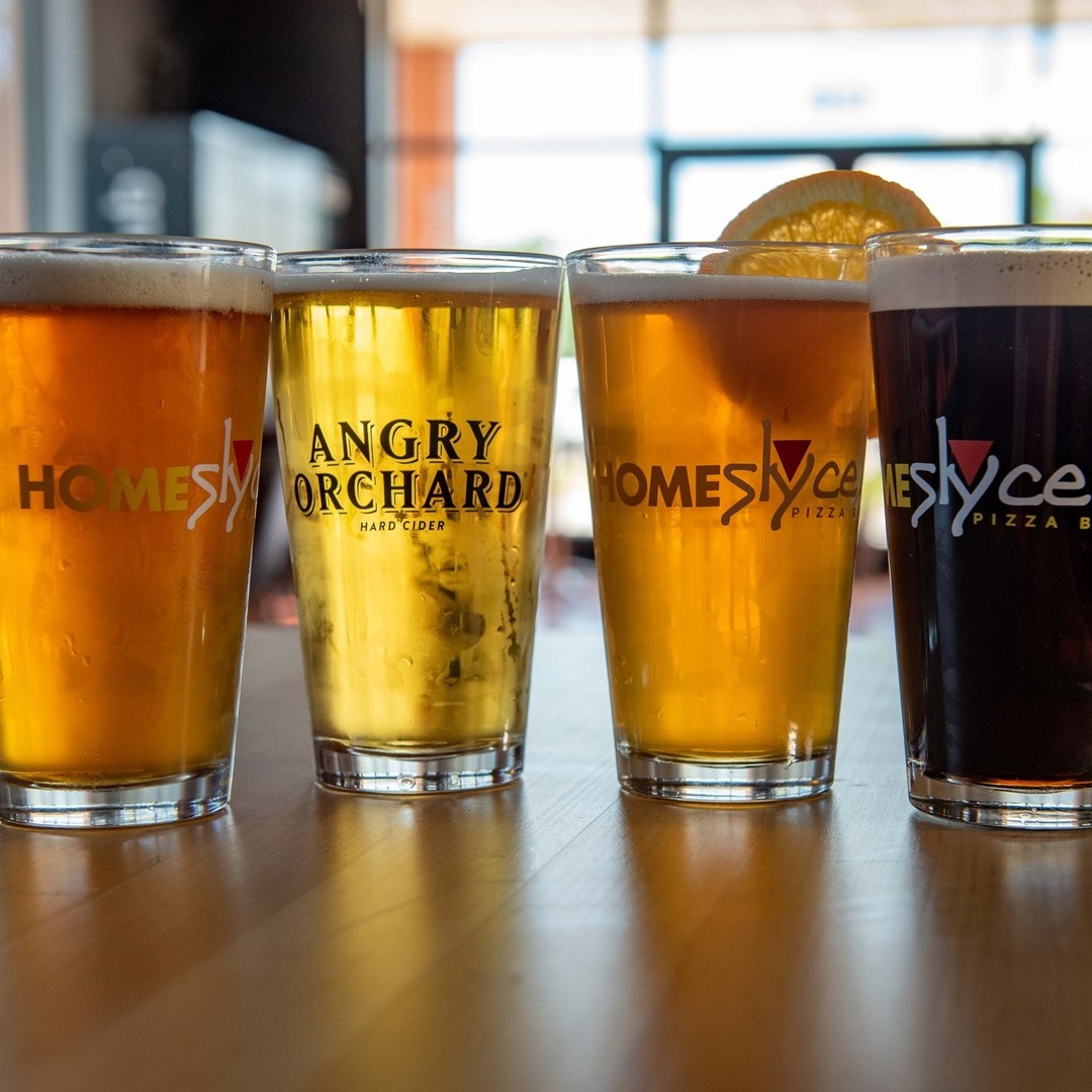 four beers lined up in a row