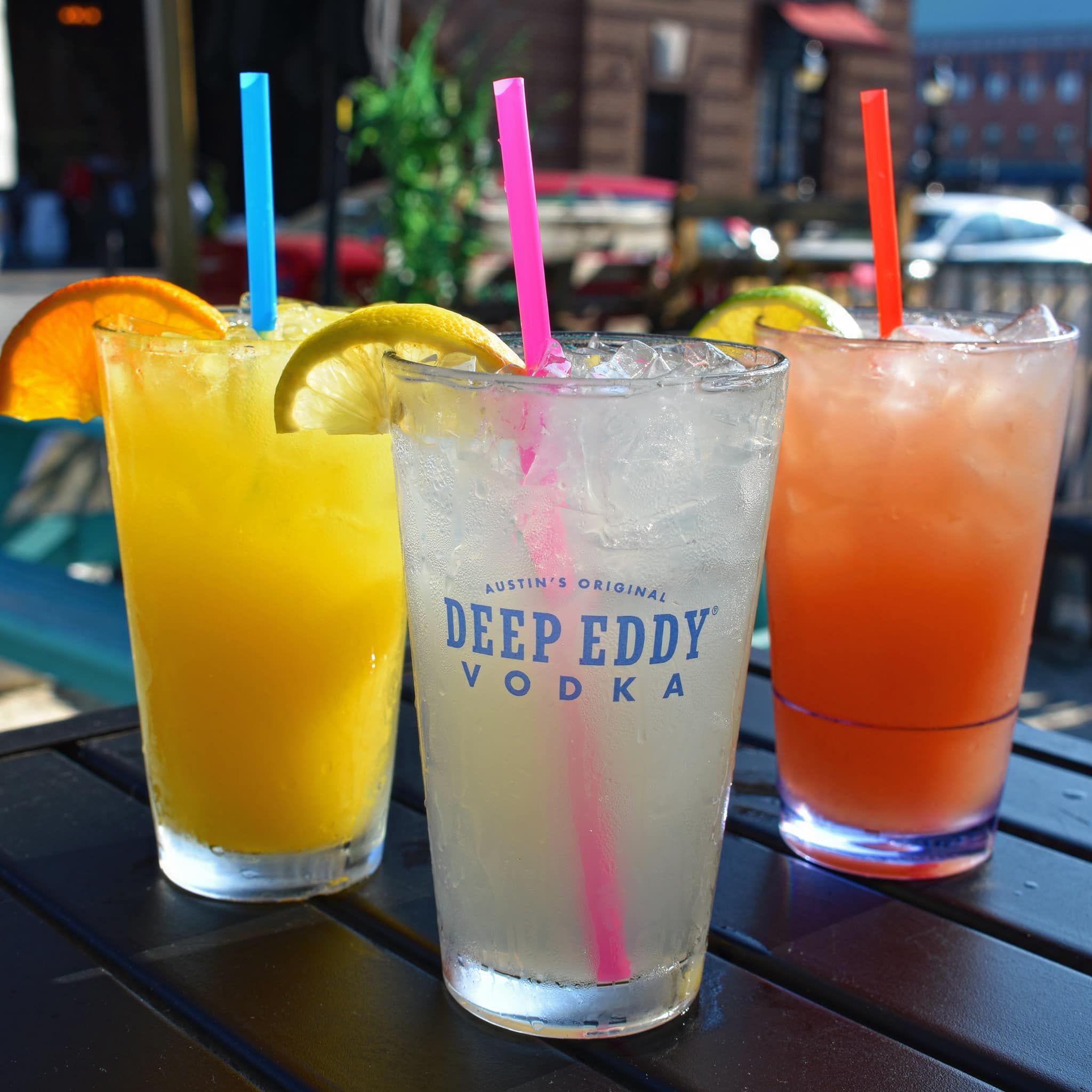 three crushes, one each flavored orange, grapefruit, and lemon