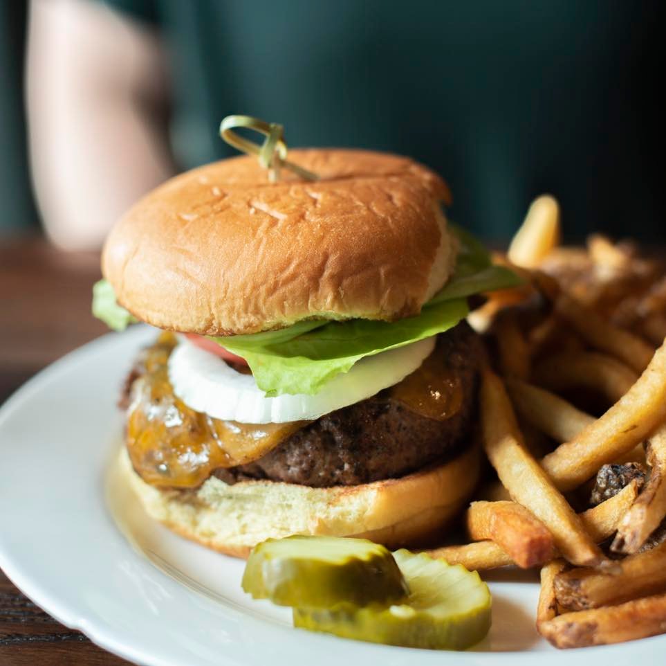 a burger with fries