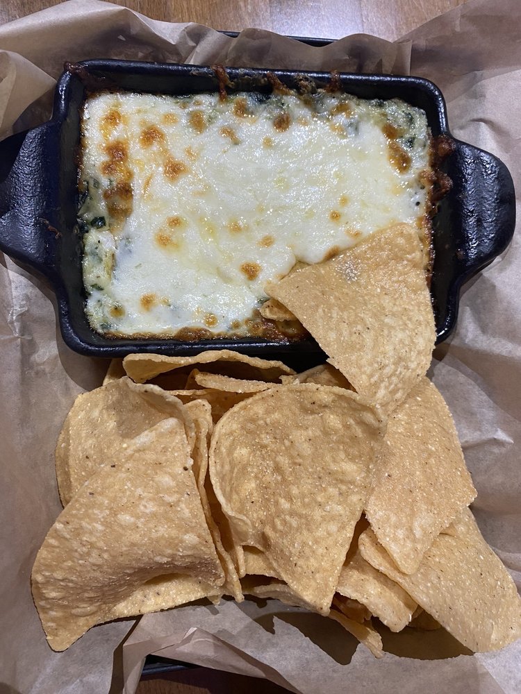 spinach artichoke dip with tortilla chips