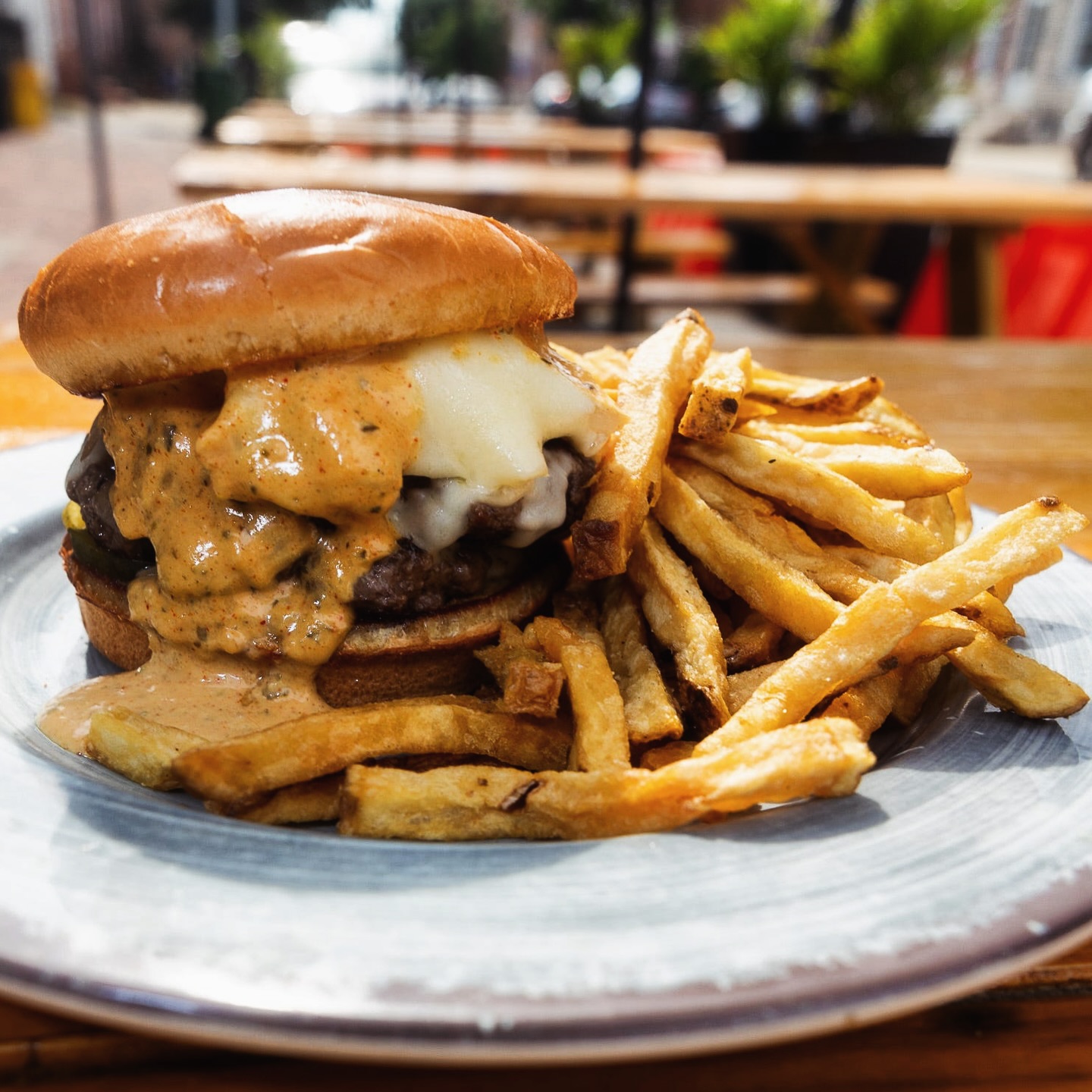 a burger with fries