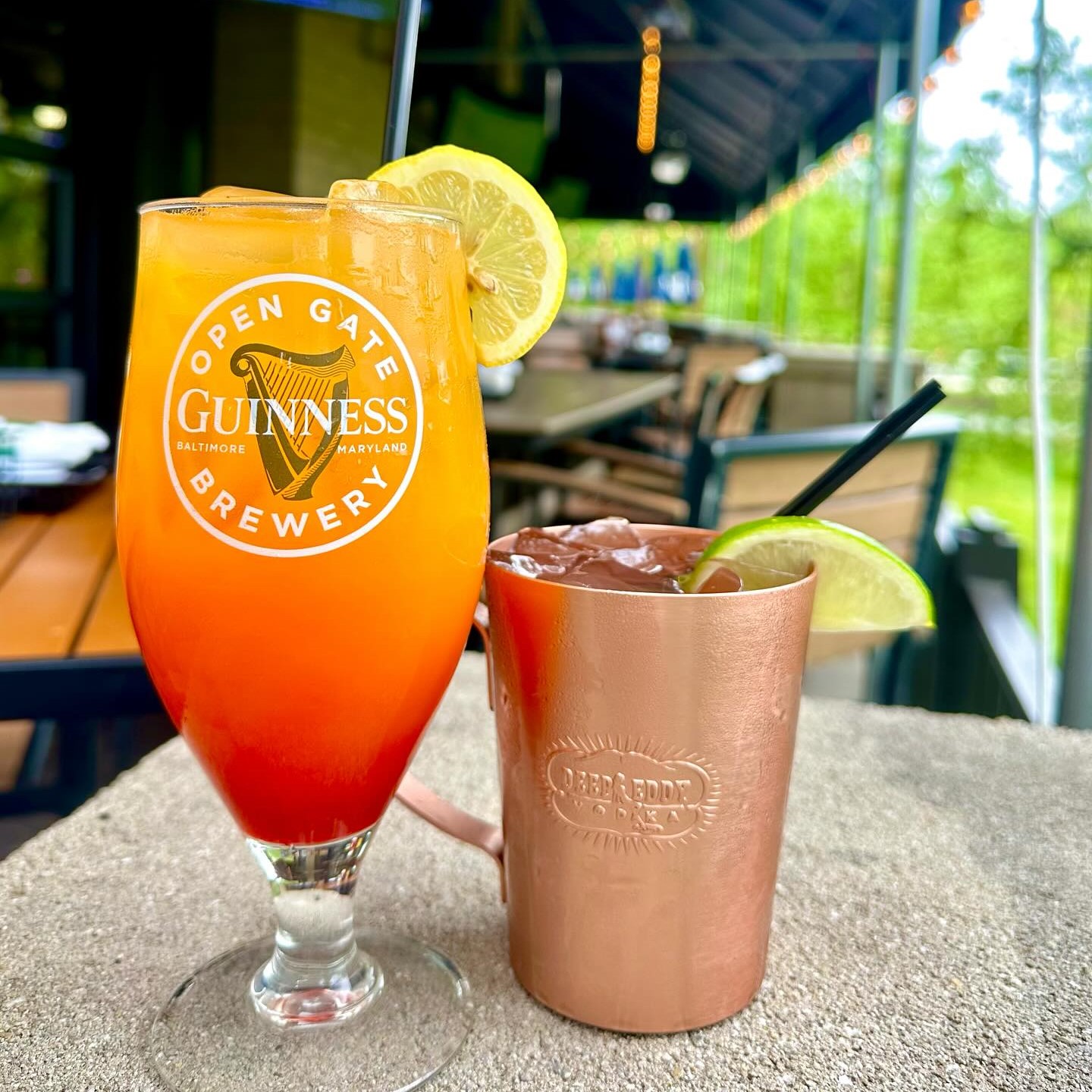 two cocktails, one called a Black Eyed Susan, and one called a Maryland Mule