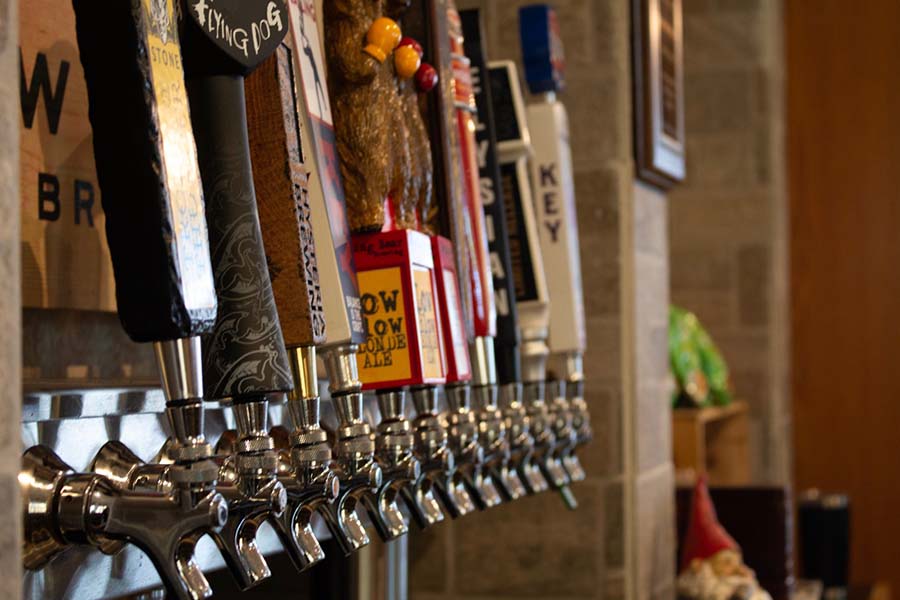 a line of beer taps