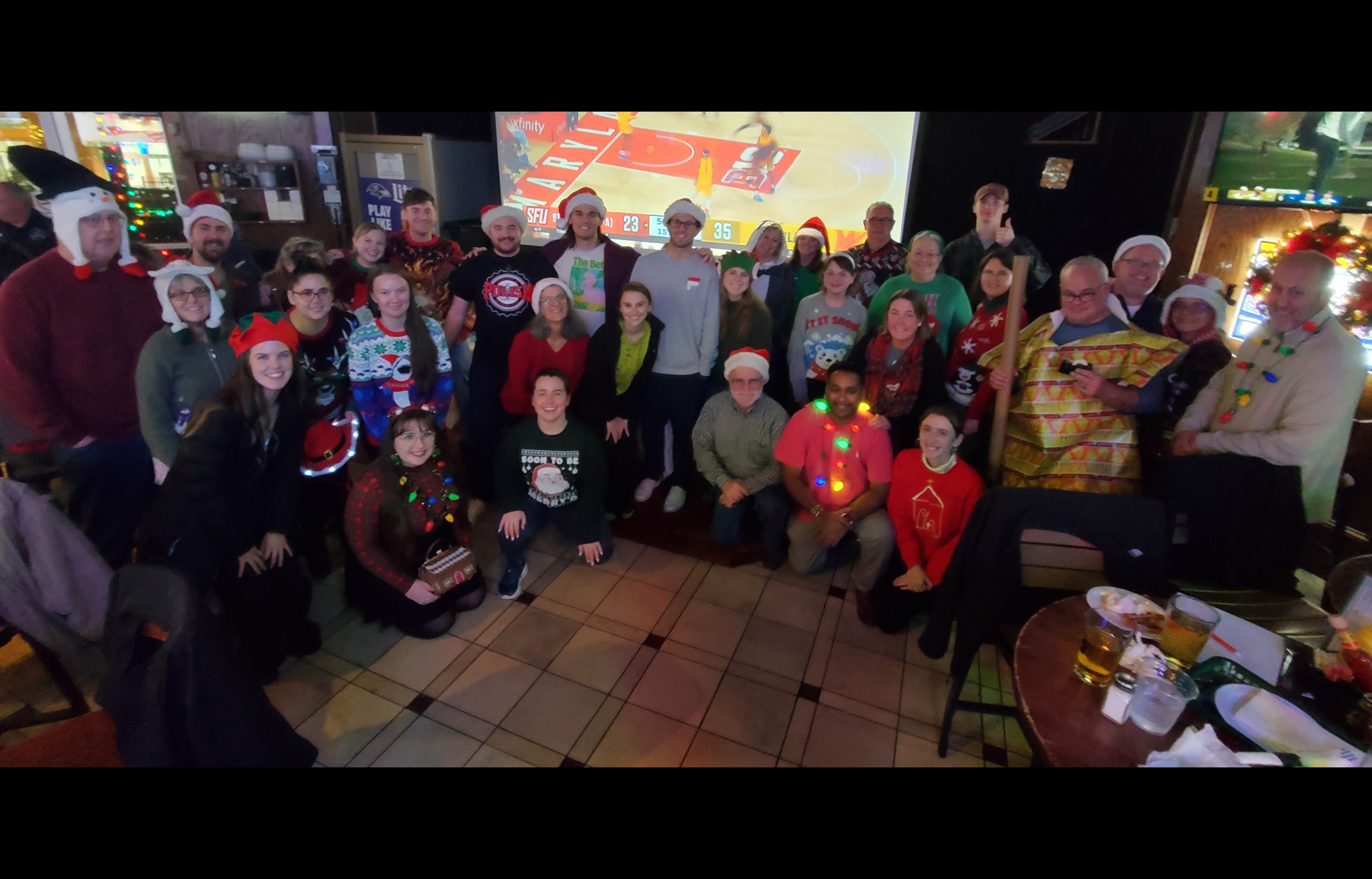 players dressed up for the winter holidays at Looney's Pub - Maple Lawn