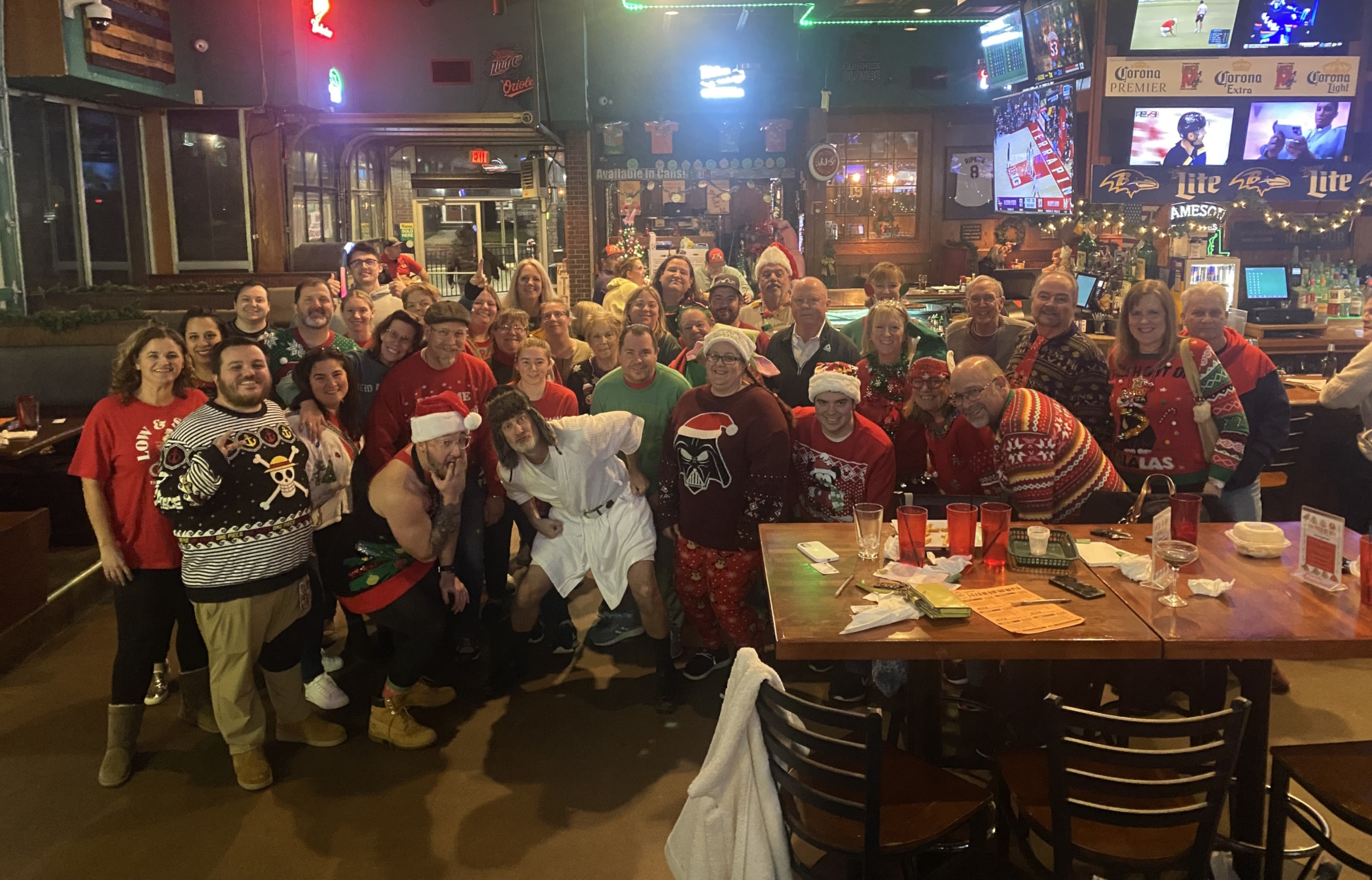 players dressed up for the winter holidays at Looney's Pub - Bel Air