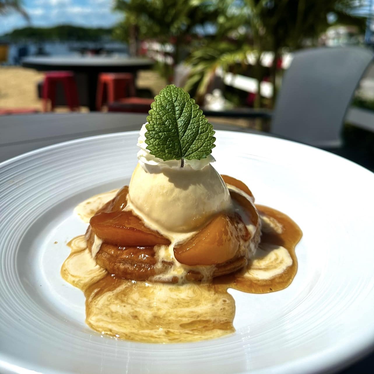 a peach cobbler with ice cream