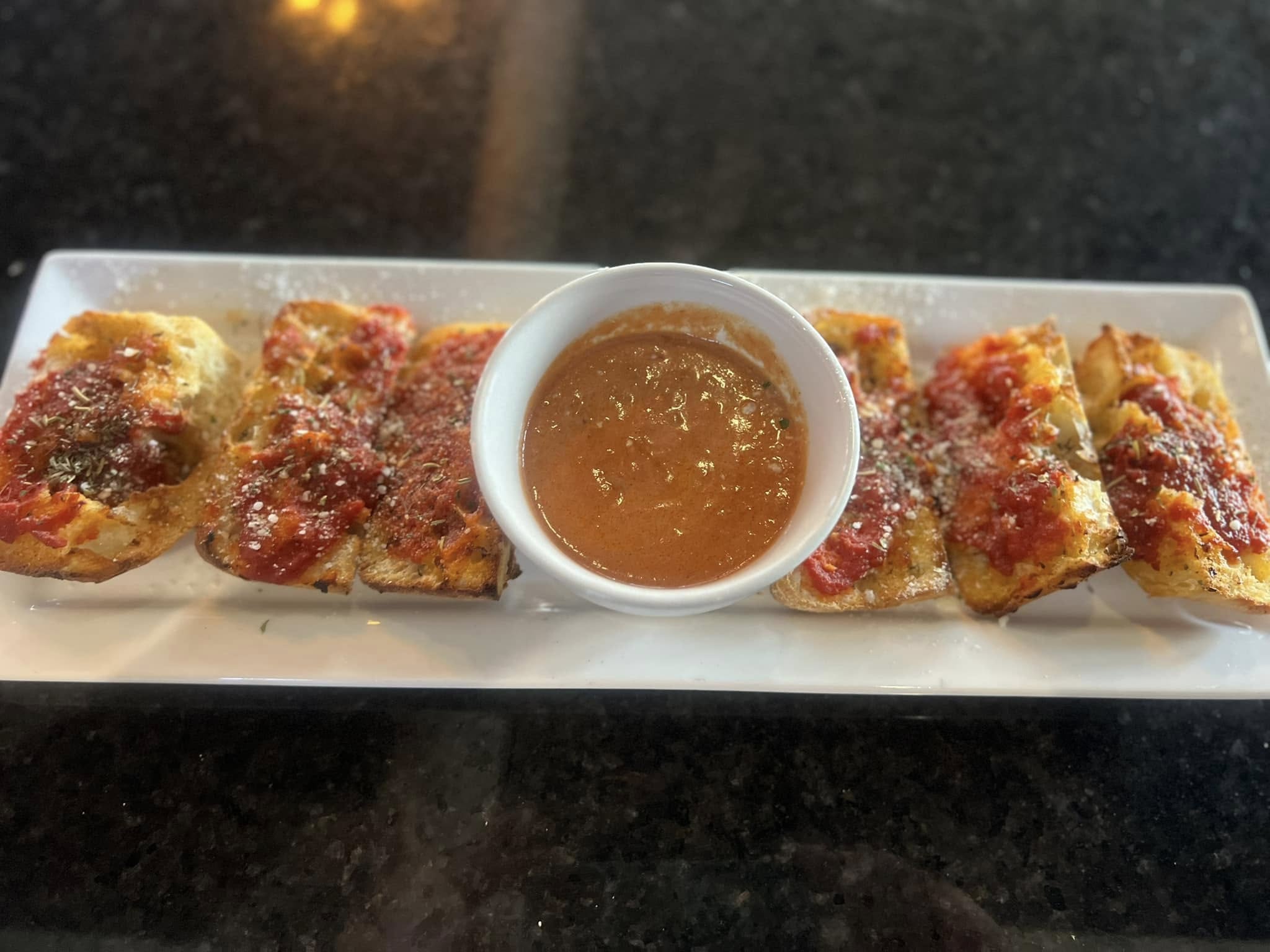 a plate of pizza bread