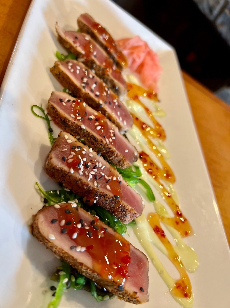 a plate of sesame-crusted ahi tuna