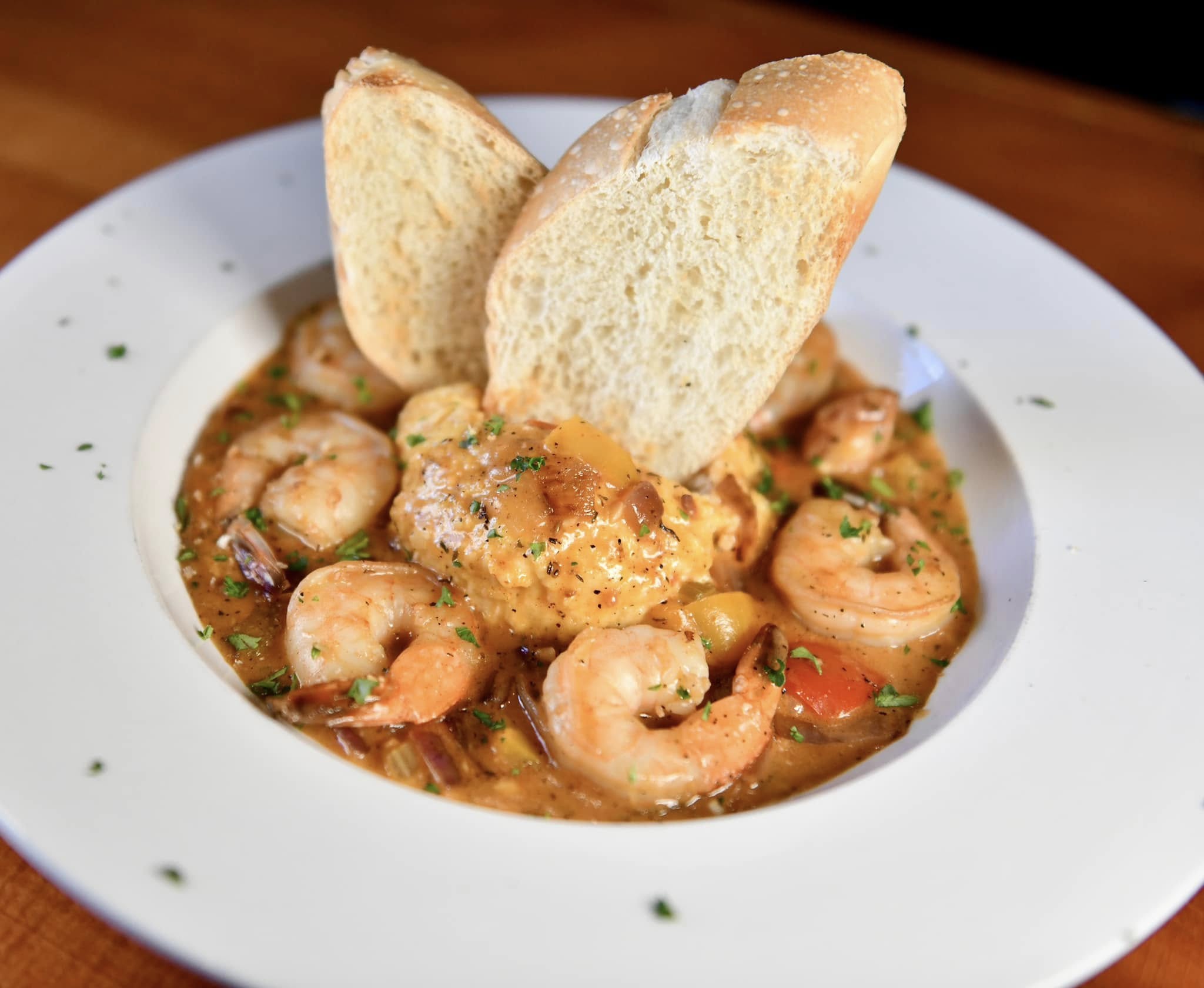 a bowl of shrimp and grits