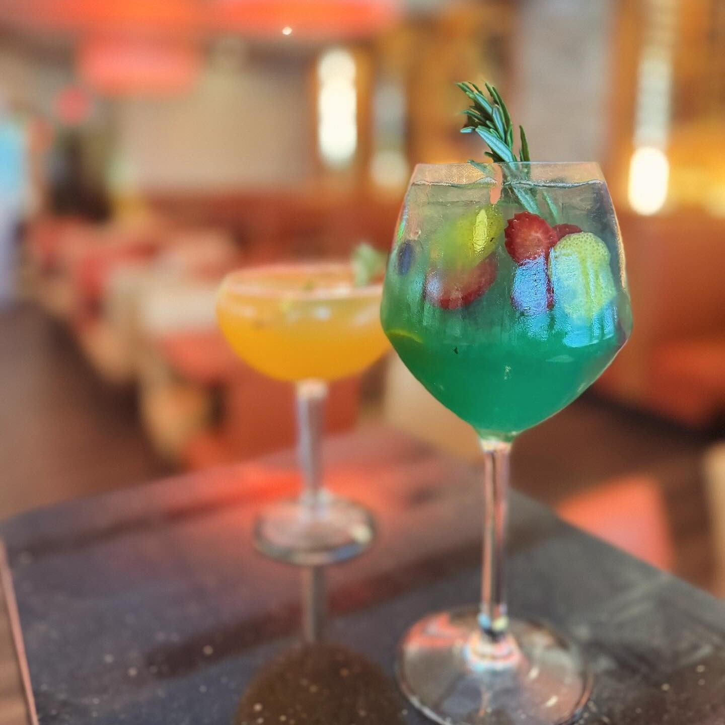 a blue "Fruit Infusion" cocktail