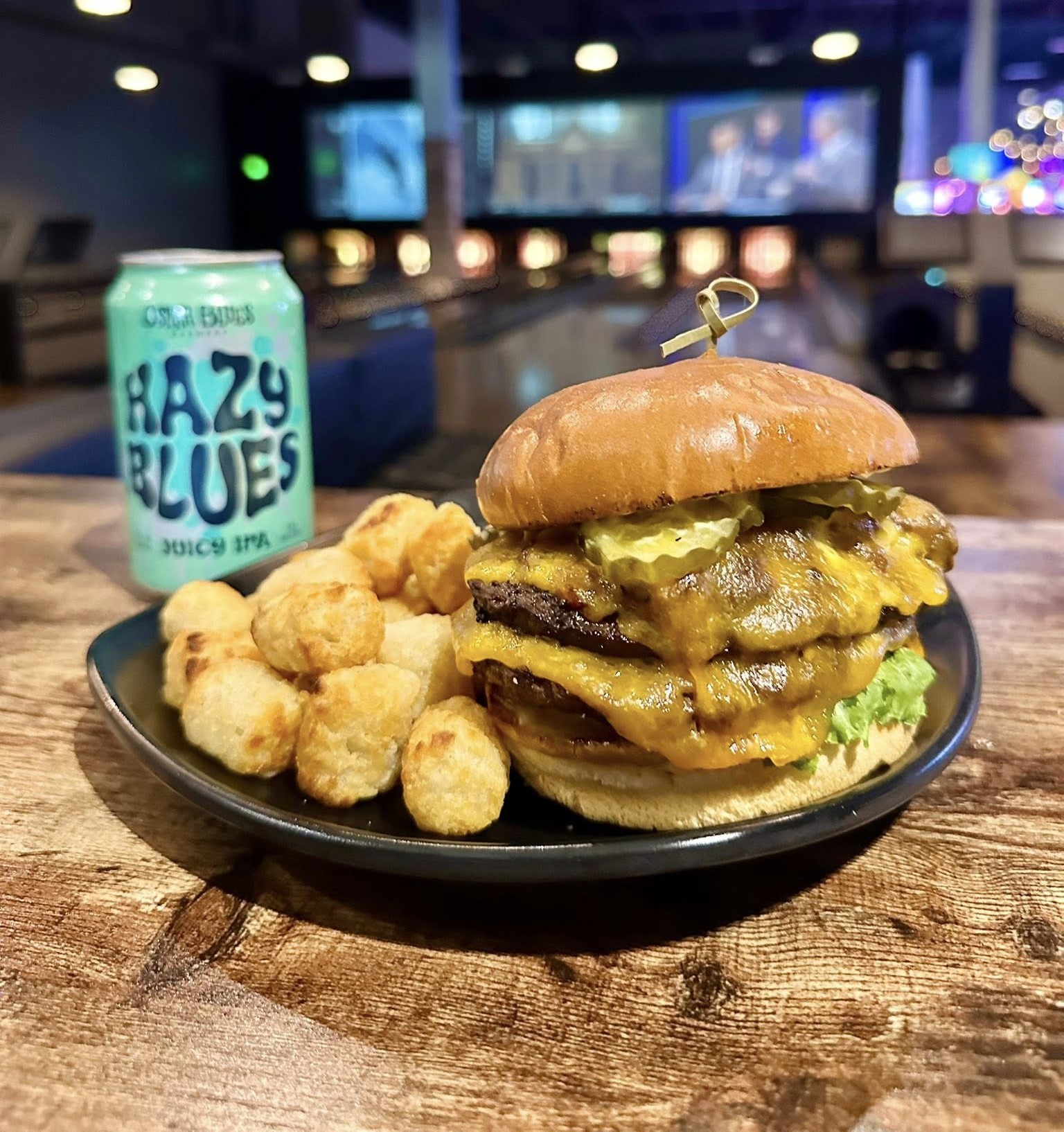 a smash burger with tater tots