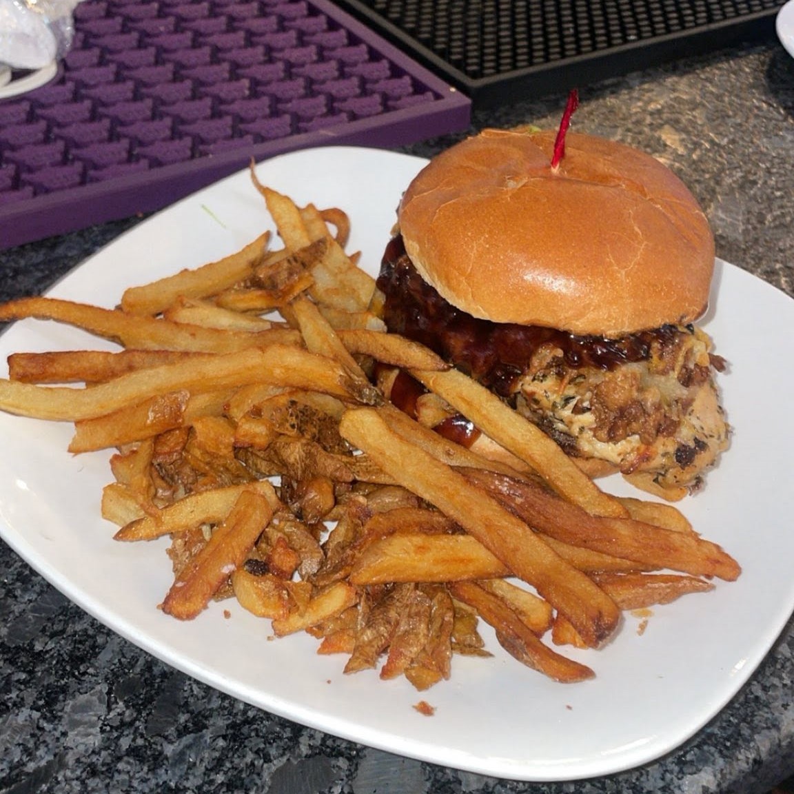 a BBQ sandwich with fries