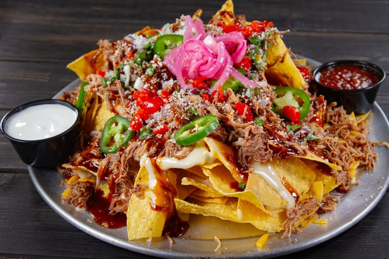 a plate of BBQ Pulled Pork Nachos